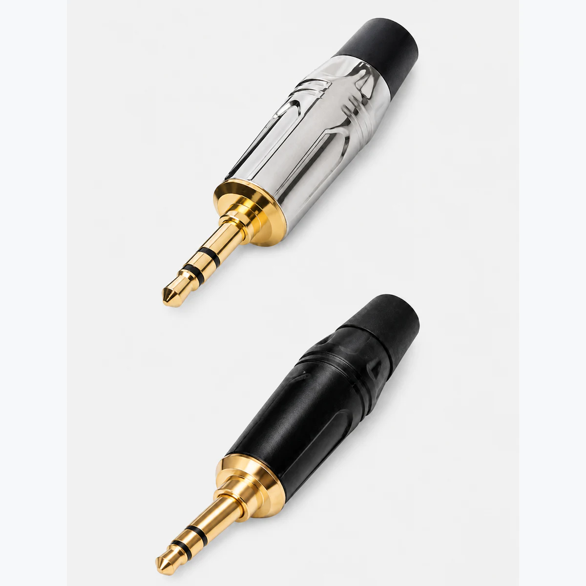 Silver and black 3.5mm phone plugs